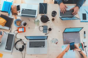 Looking down on laptops on a table